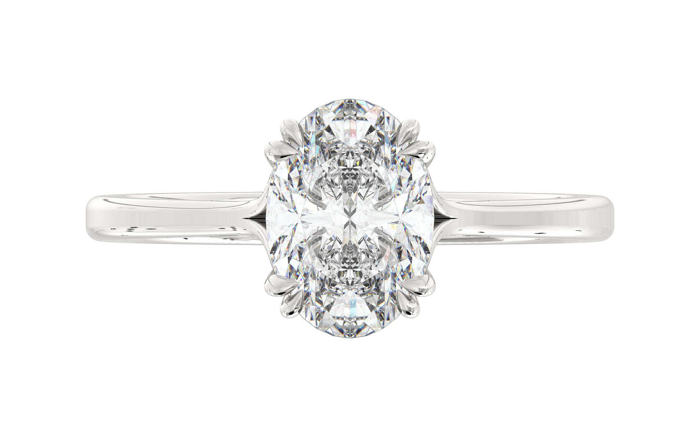 Golden oval solitaire diamond ring with twisted double prongs, symbolizing timeless love and romance.