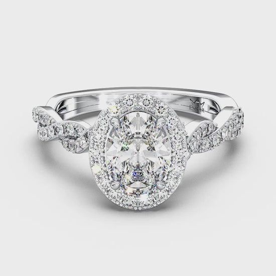 Oval Diamond Halo Twisted Shank Engagement Ring