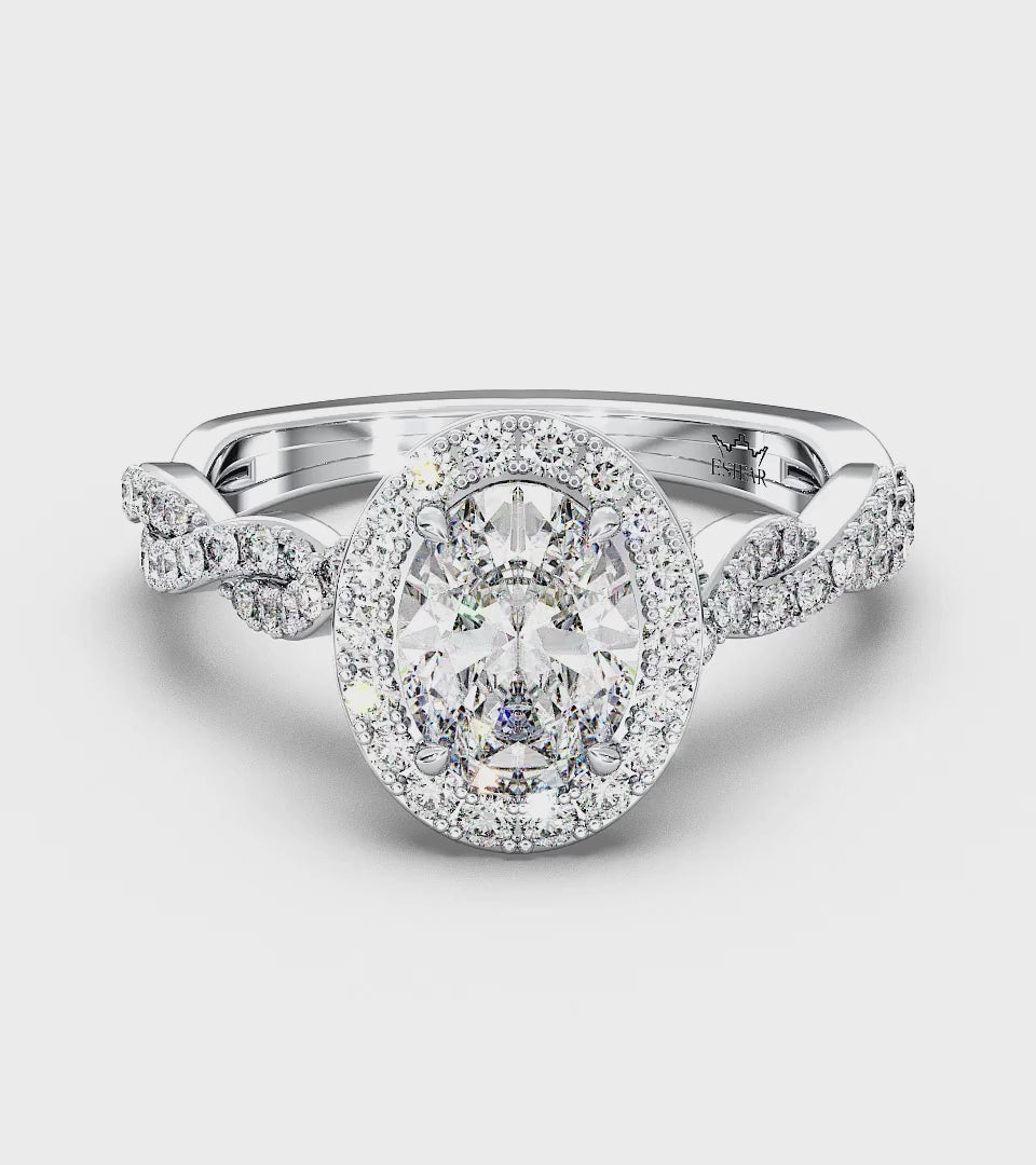 Oval Diamond Halo Twisted Shank Engagement Ring